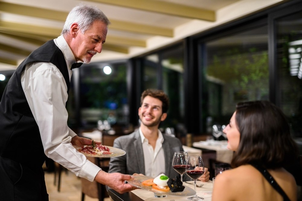 served by a waiter in a restaurant
