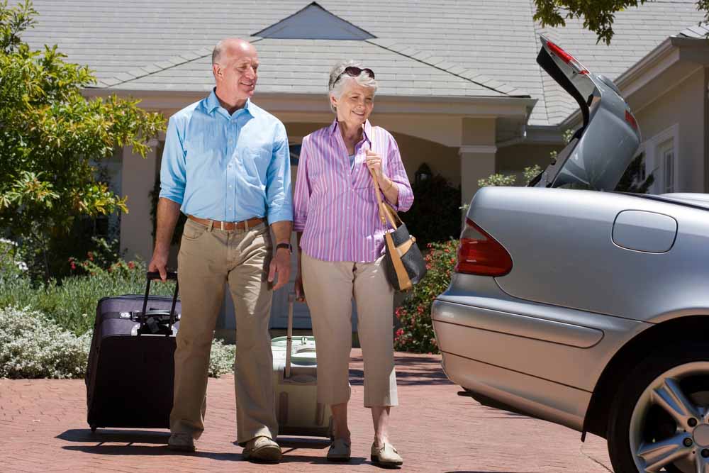 a person carrying luggage and going on a trip